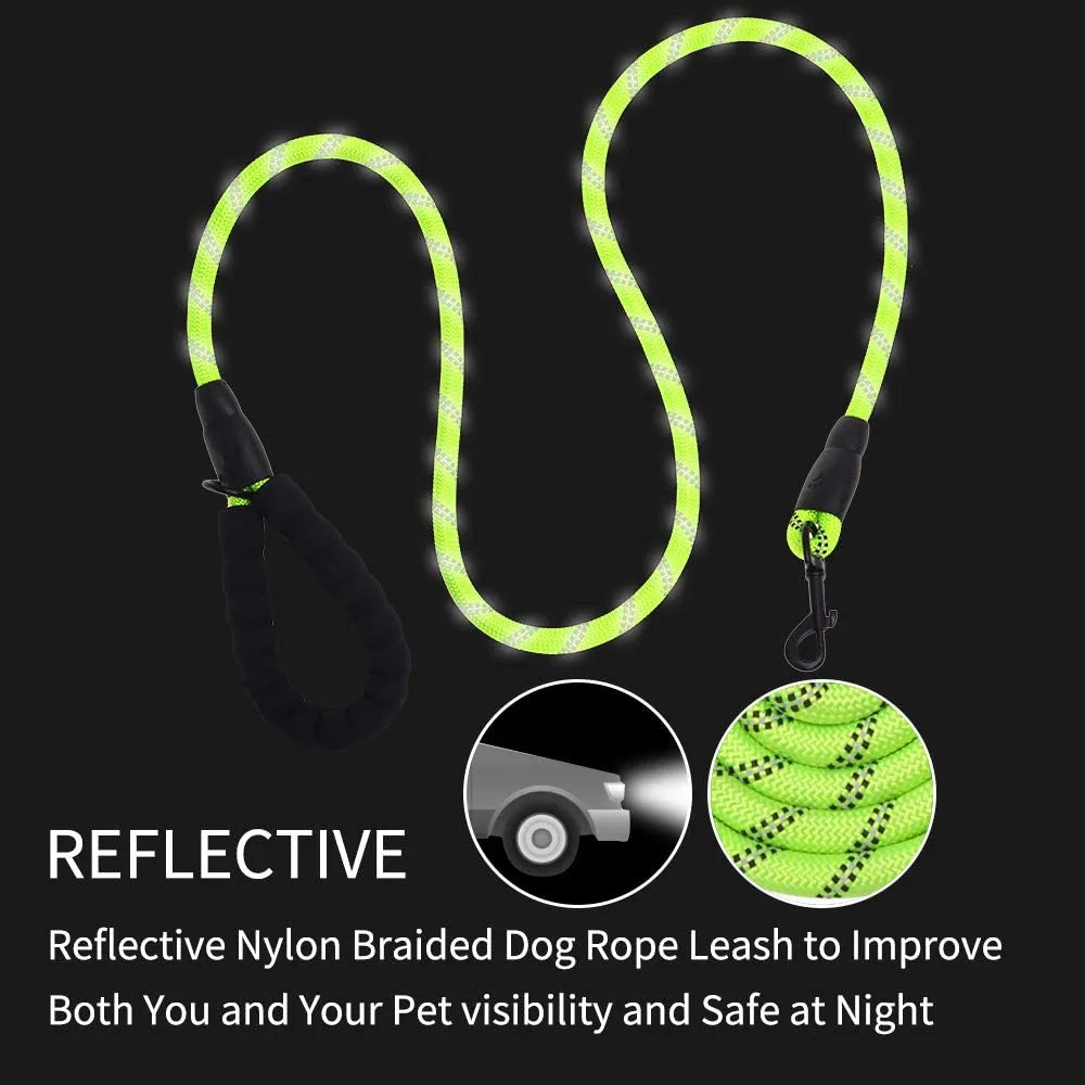 Green reflective dog leash made from nylon, featuring a padded handle and durable clasp for comfort and control.