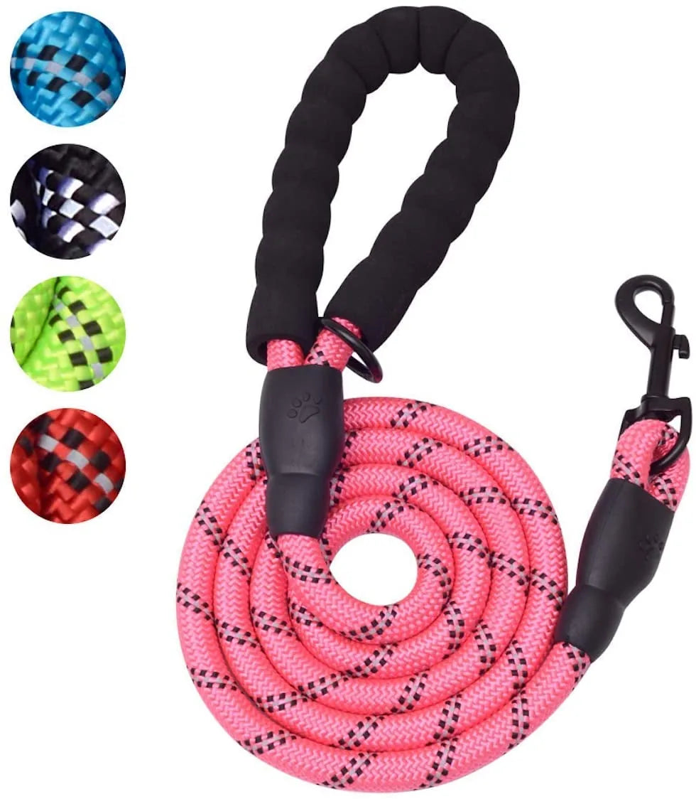 6 FT pink dog leash coiled with ergonomic grip, made from strong nylon, featuring reflective strips for safety.