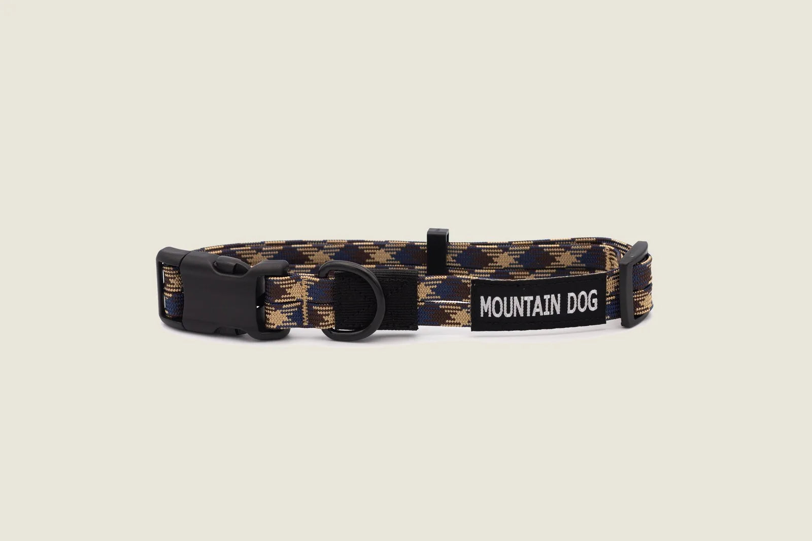 Adventure-style dog collar featuring a mountain argyle pattern in navy and tan, made of durable nylon climbing rope.