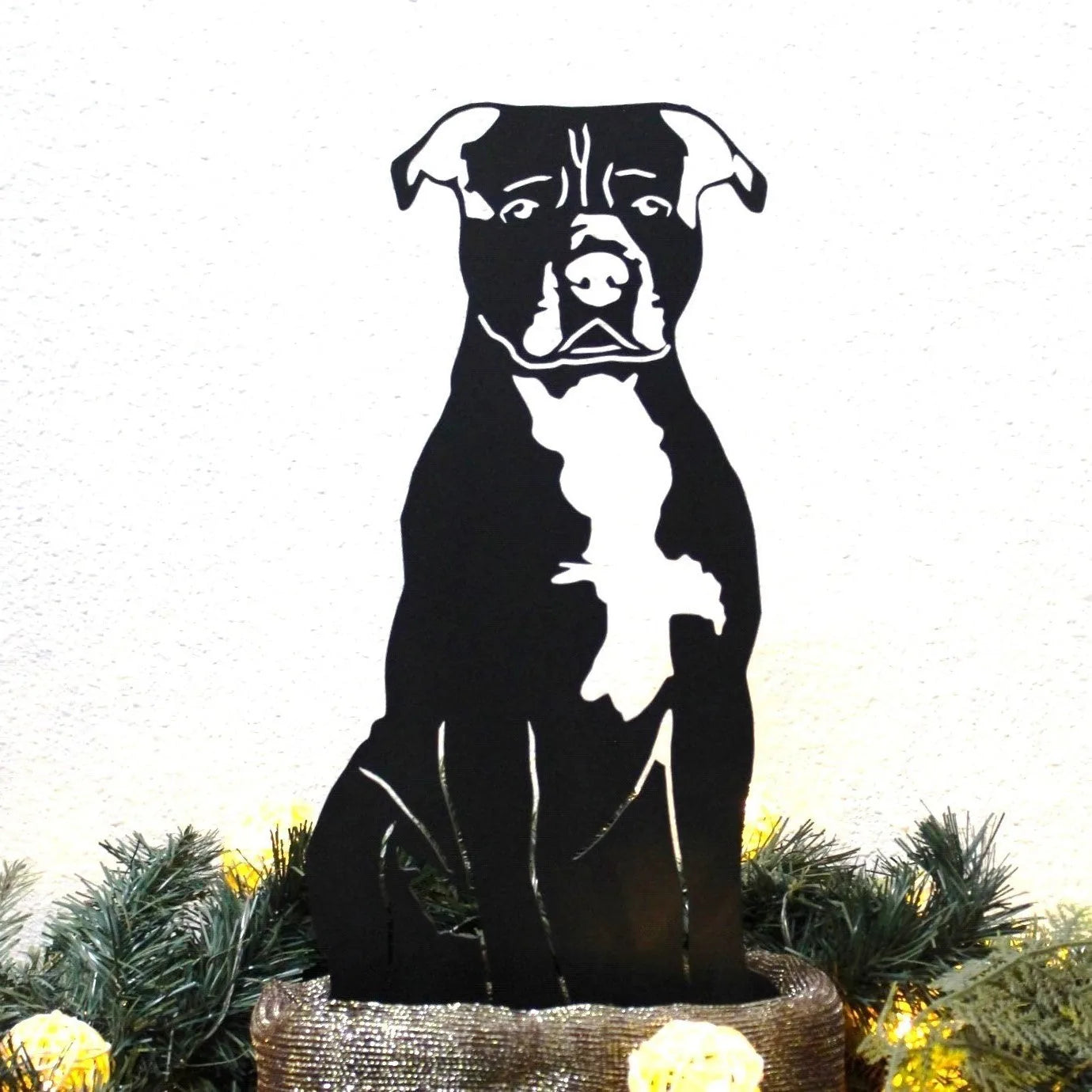 Handcrafted metal silhouette of an American Staffordshire Terrier in matte black, set against a light background.