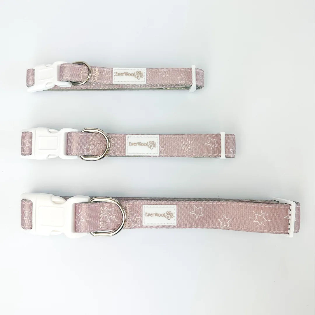 Adjustable pink dog collars with white star pattern and plastic buckles, showcasing EverWoof branding.
