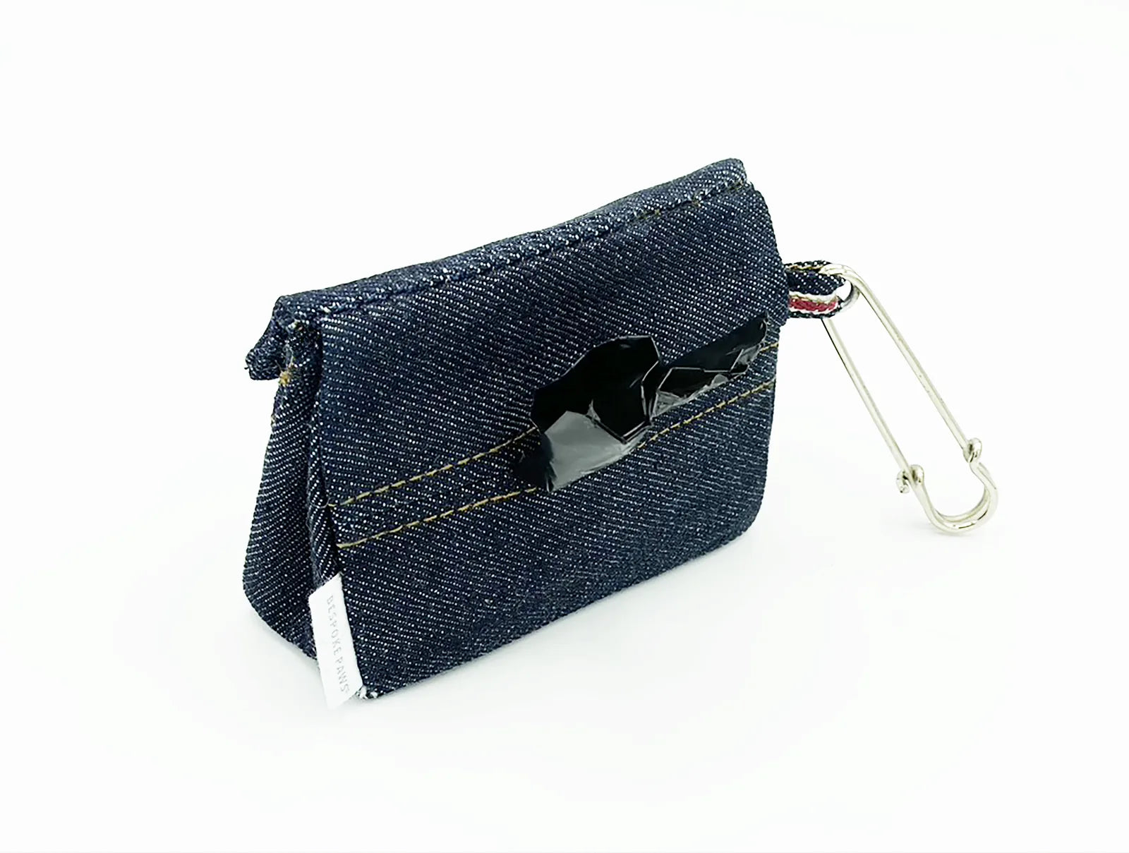 Denim waste bag dispenser with a stainless steel clip, featuring a card slot and black accent detail.