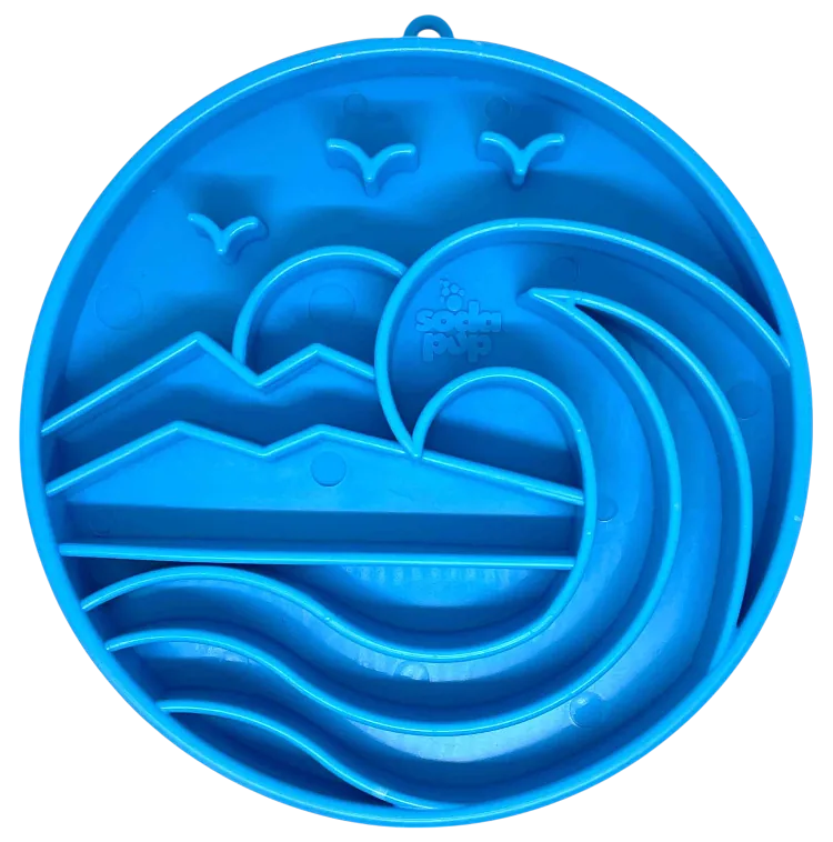 Light blue shallow dog bowl with raised ridges and a Baja-inspired wave pattern for slow feeding and mental enrichment.