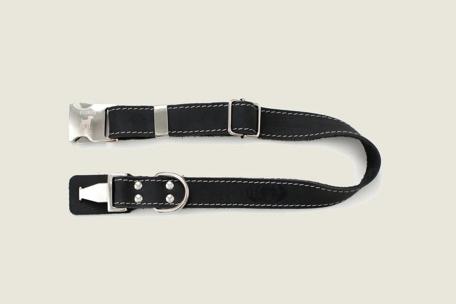 Bestseller quick-release black leather dog collar with metal buckle and silver accents, designed for comfort and durability.