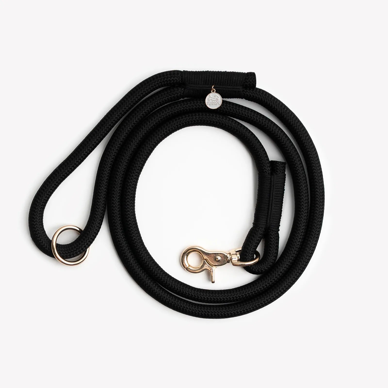 Black braided rope leash by FURLOU with gold clasp and O-ring for accessories, designed for comfortable, durable walks.