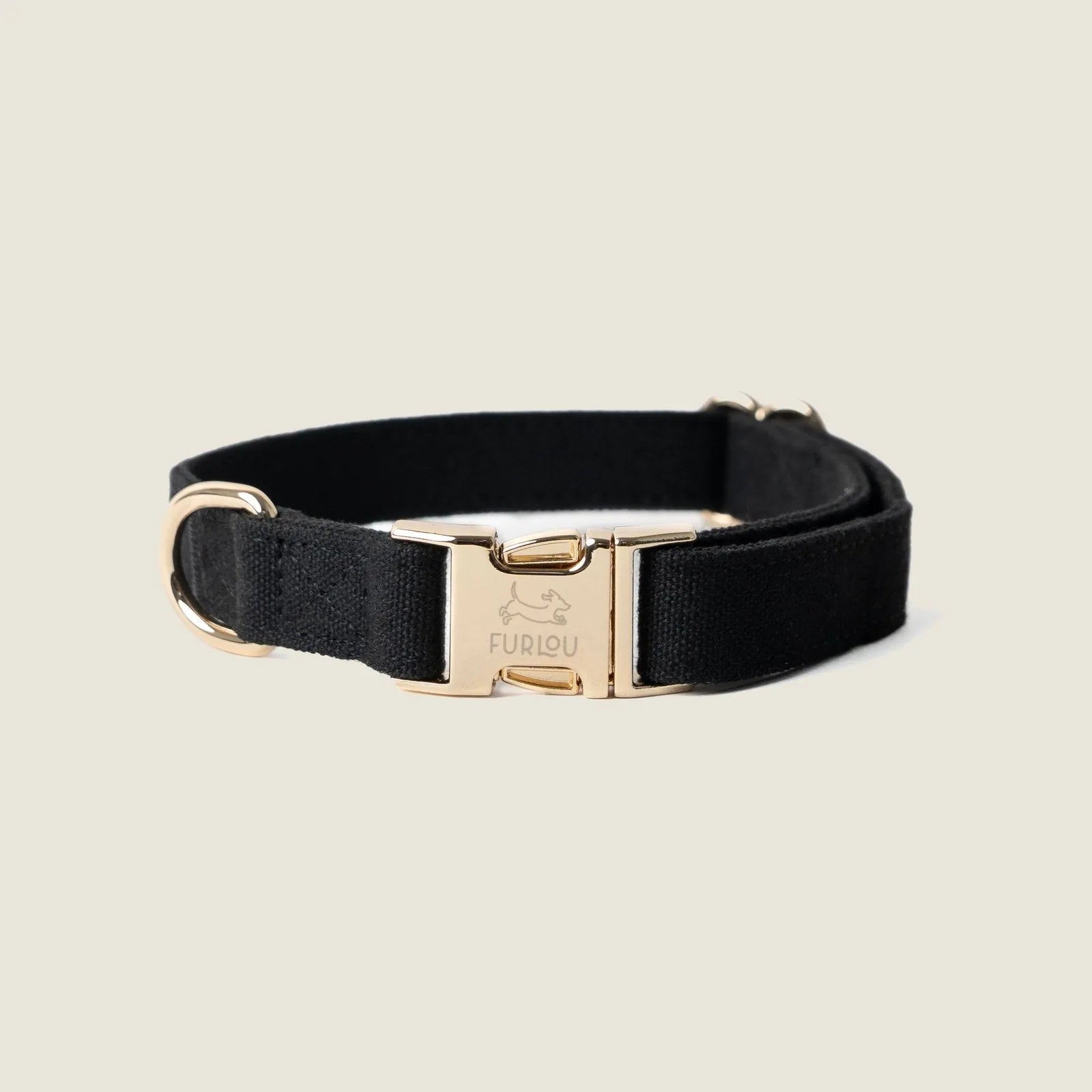 Black canvas dog collar by FURLOU featuring a gold buckle and lightweight design, perfect for stylish everyday wear.