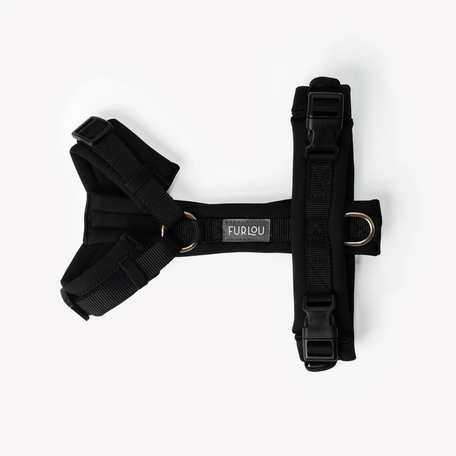 Black comfort dog harness by FURLOU featuring adjustable straps, breathable padding, and gold hardware accents.
