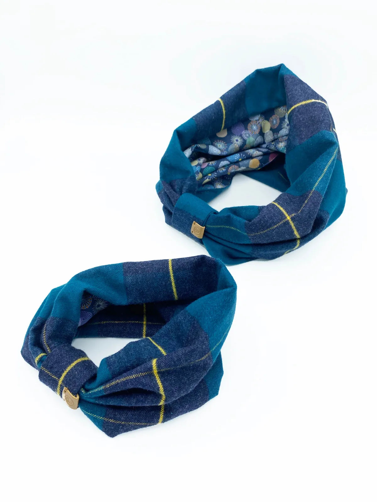 Reversible teal and dark blue plaid snood by BESPOKE PAWS, featuring a cozy brushed cotton flannel design.