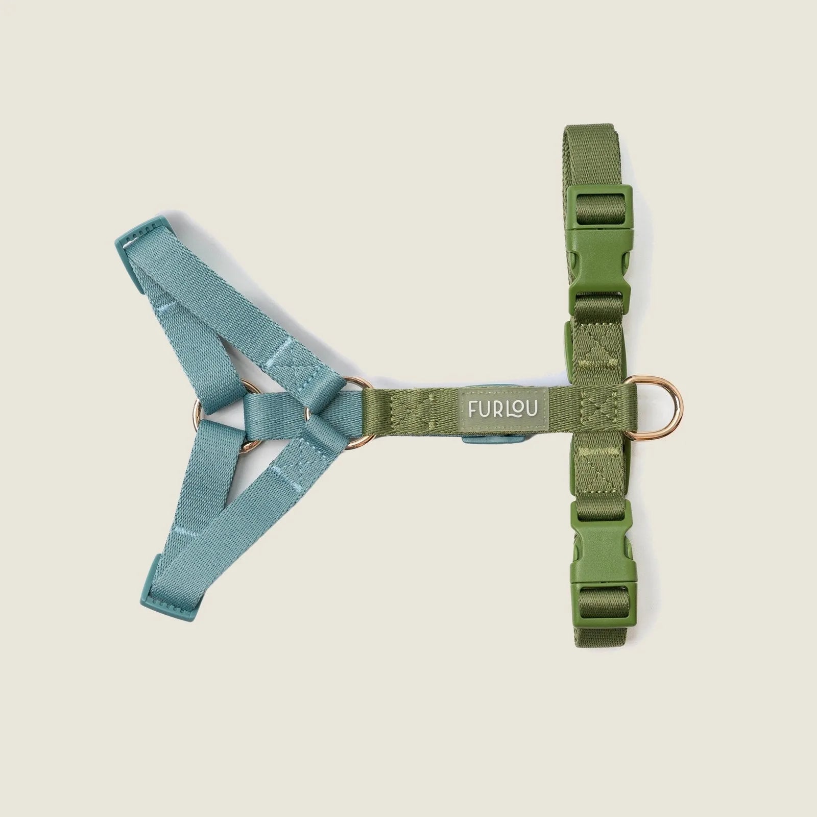 Blue and green strap harness by FURLOU featuring adjustable points and gold hardware for comfort and style.