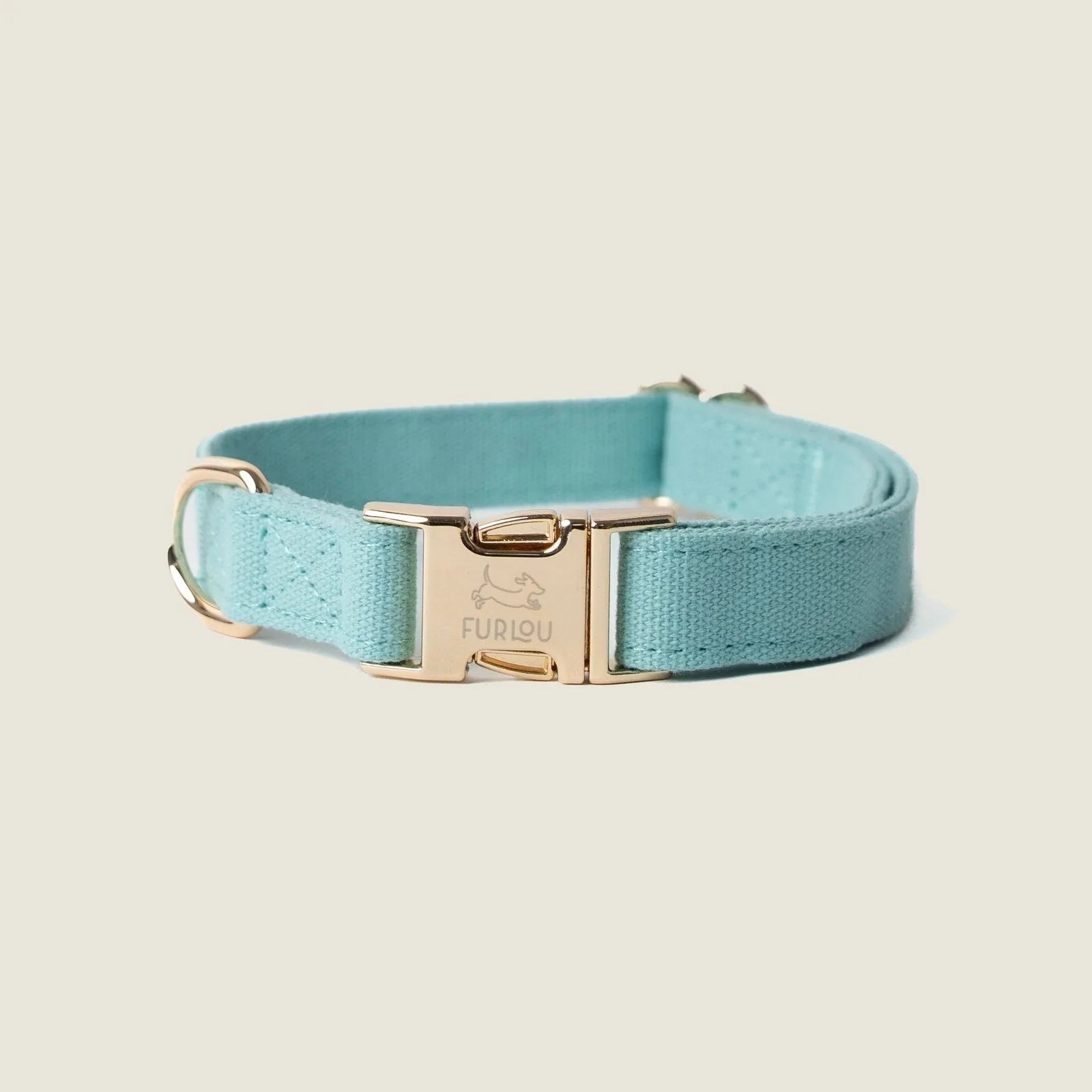 Calming blue canvas dog collar by FURLOU with gold hardware, designed for comfort and style. Available in various sizes.
