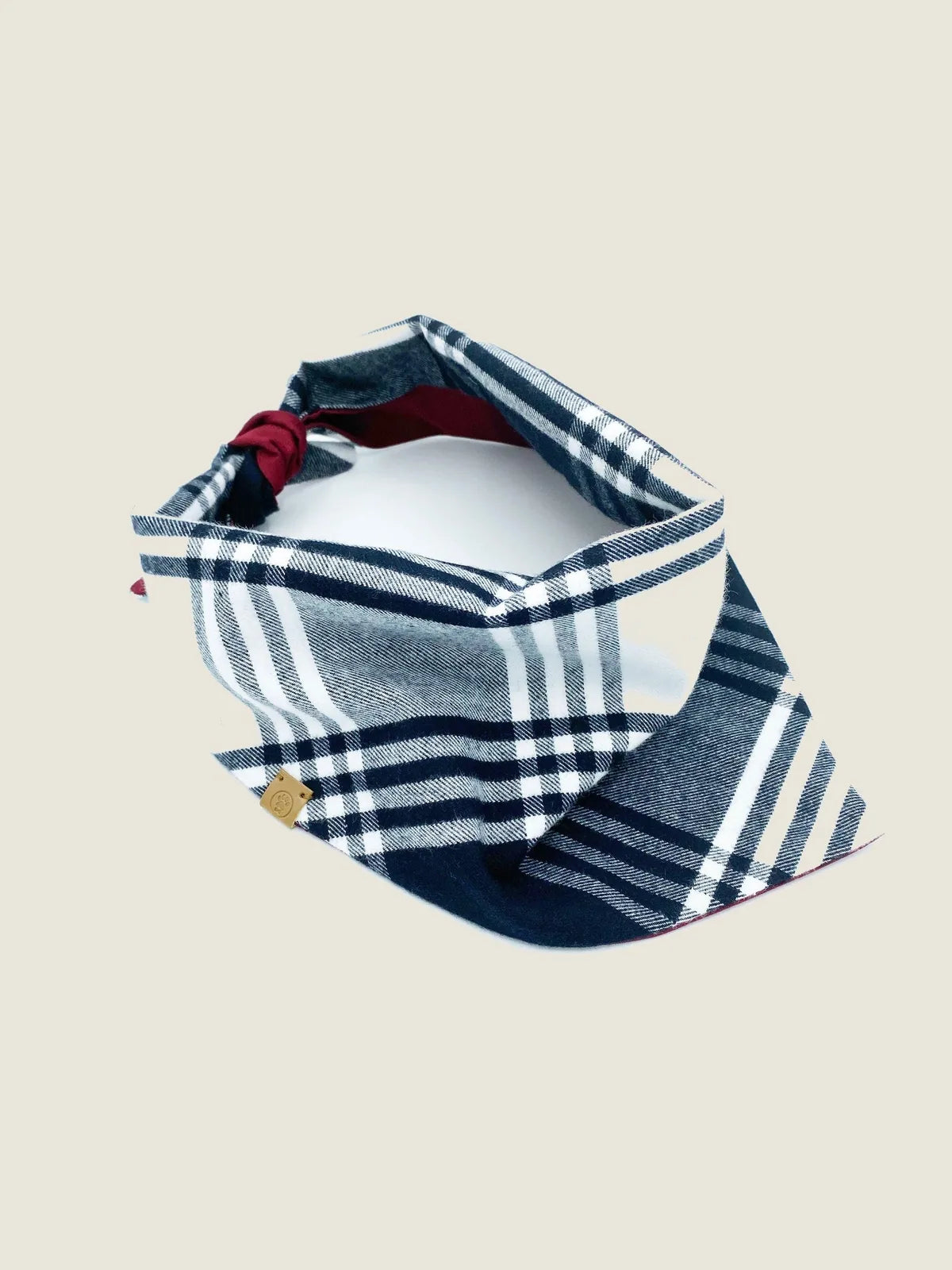 Navy and white plaid reversible pet bandana with soft cotton flannel, design features a maroon underside.