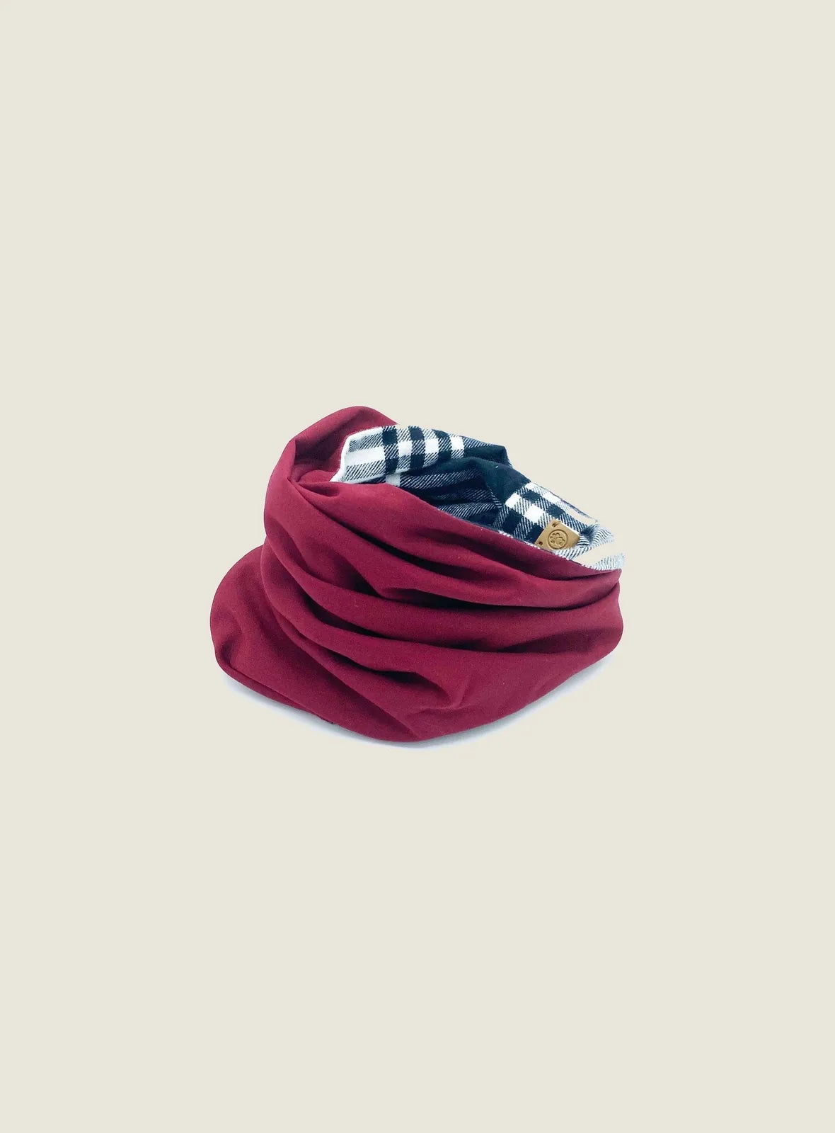 Reversible dog snood in burgundy and black checkered pattern, crafted from soft cotton flannel for warmth and style.