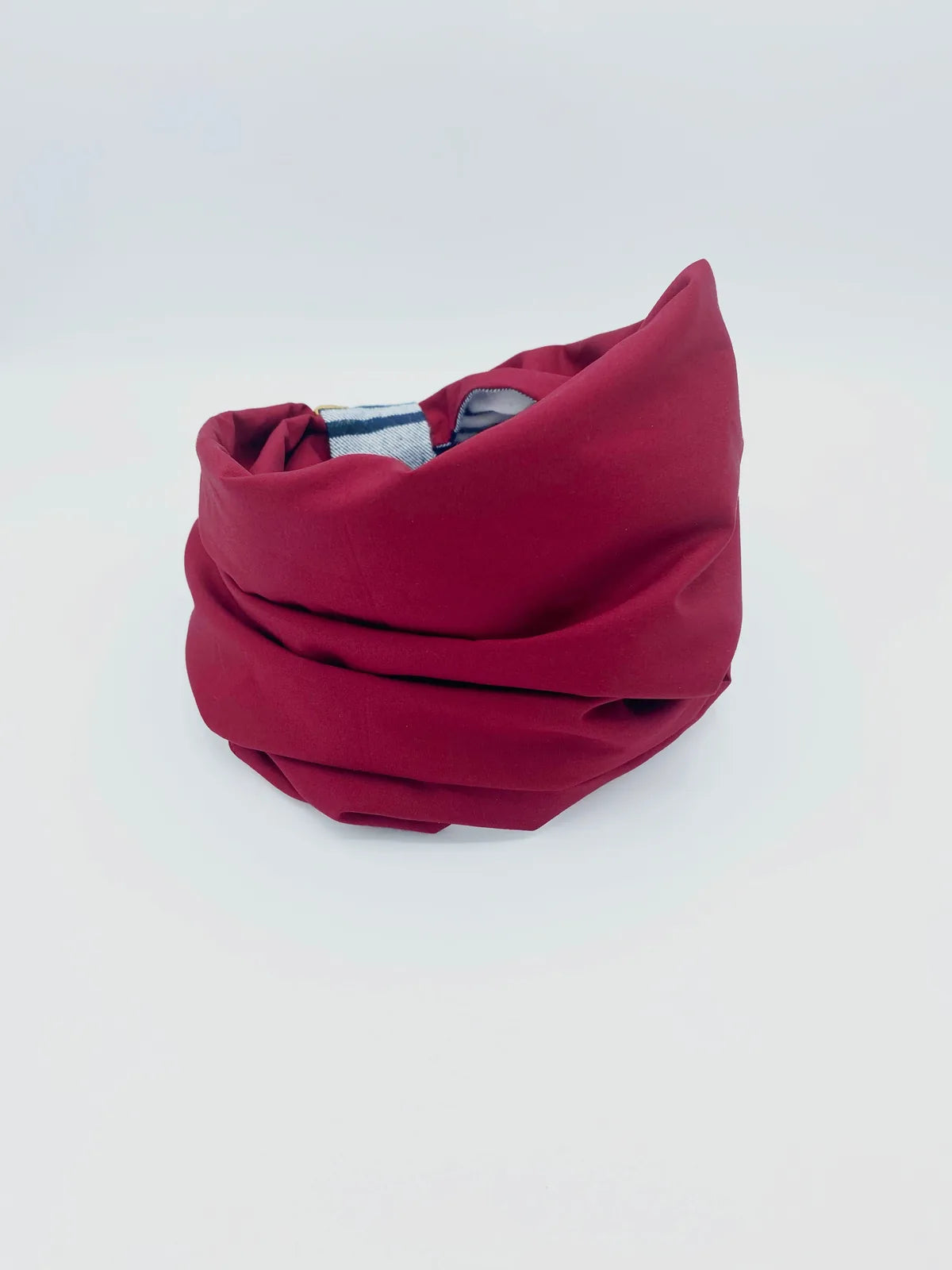 Burgundy reversible pet snood made of soft brushed cotton flannel, designed for comfort and warmth.