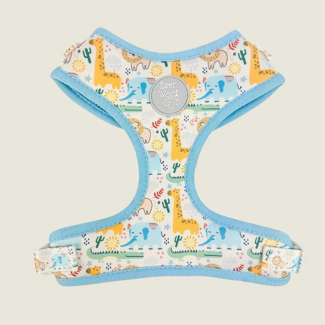 Boho Baby adjustable harness featuring playful animal designs in blue, with soft neoprene material and adjustable straps.