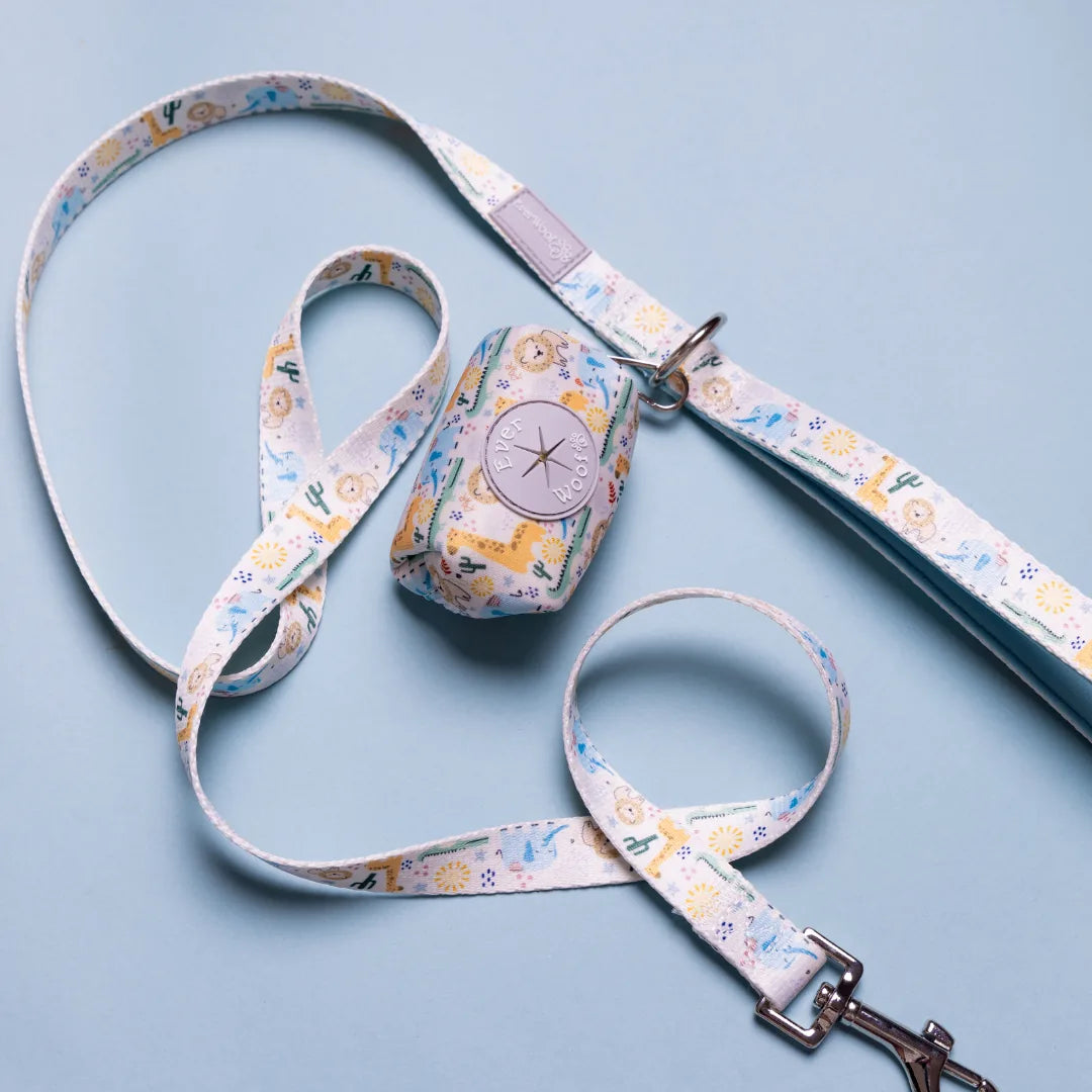 Boho Baby Leash in pastel colors with playful animal and cactus patterns, featuring a clip-on for essentials.