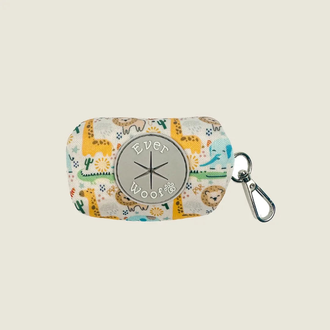 Boho Baby Waste Bag by EverWoof featuring playful animal patterns in yellow, green, and cream, with a zinc alloy swivel hook.