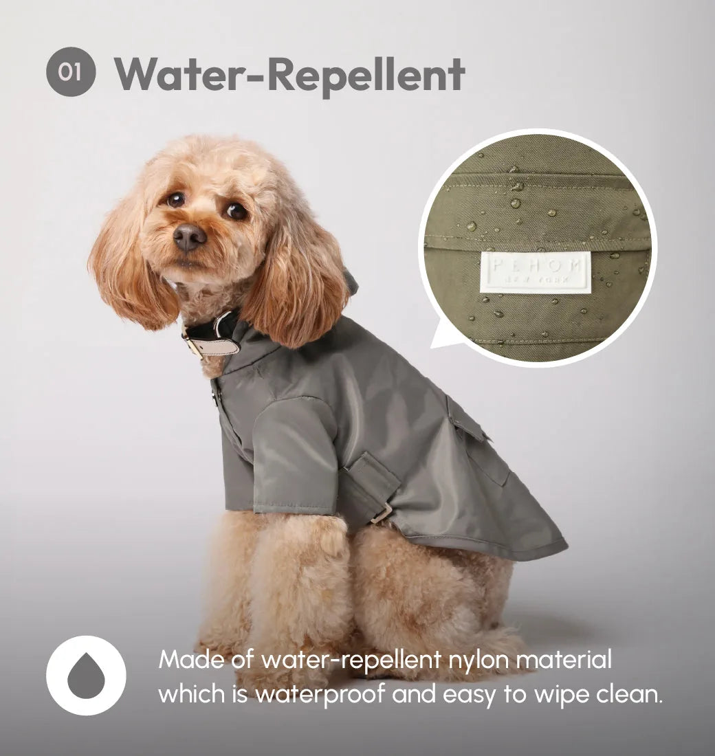Gray water-repellent dog raincoat featuring logo snaps, adjustable Velcro, and a back pocket for added convenience.