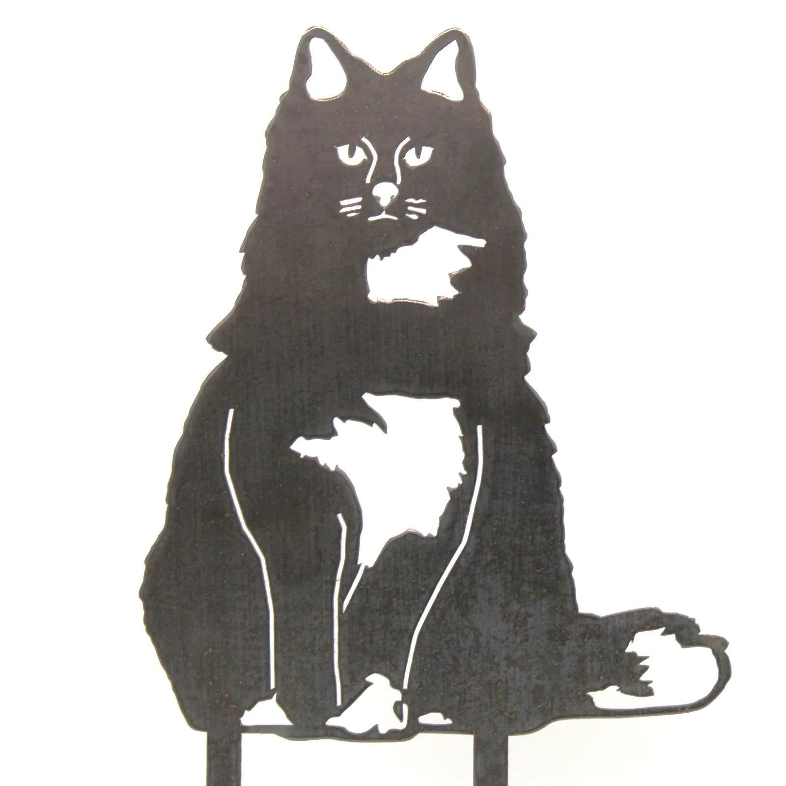 Handcrafted black metal silhouette of a British Longhair cat with distinct white markings, designed for outdoor display.