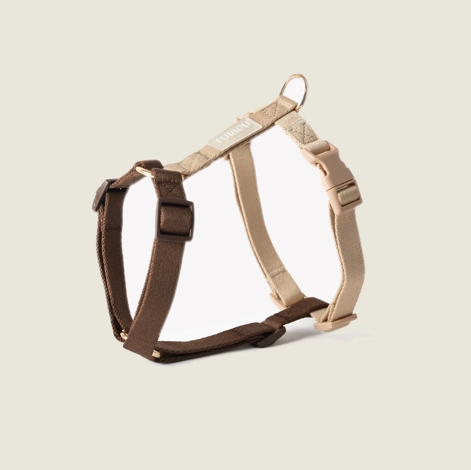 Brown and tan strap harness by FURLOU with gold hardware and five adjustment points for a comfy fit.