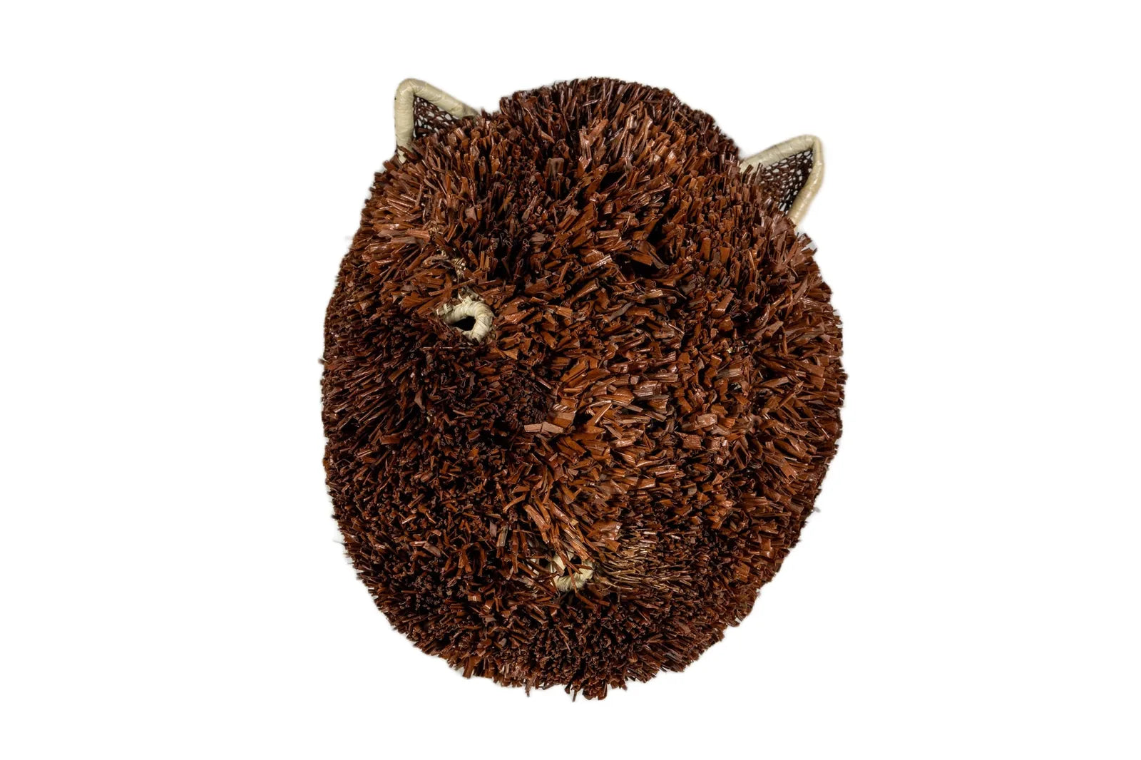 Handwoven brown and white Labradoodle dog mask with textured natural reeds, featuring ears and a unique artisanal design.