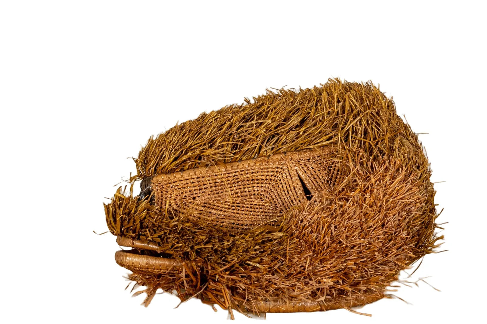 Handwoven Brown Labradoodle mask featuring natural hues and intricate patterns, perfect for unique wall decor.