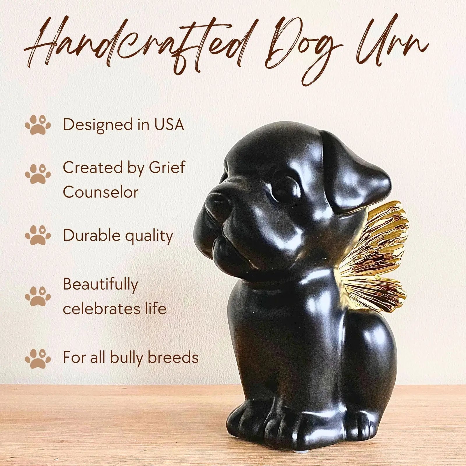 Handcrafted black dog urn with gold wings, designed for bully breeds, symbolizing remembrance and celebration of life.
