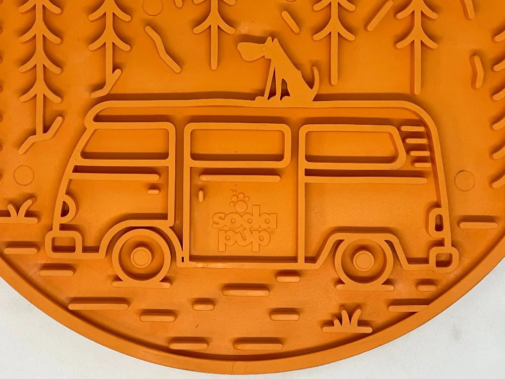 Orange retro van design lick mat with textured surface and suction cups for dog enrichment and engagement.