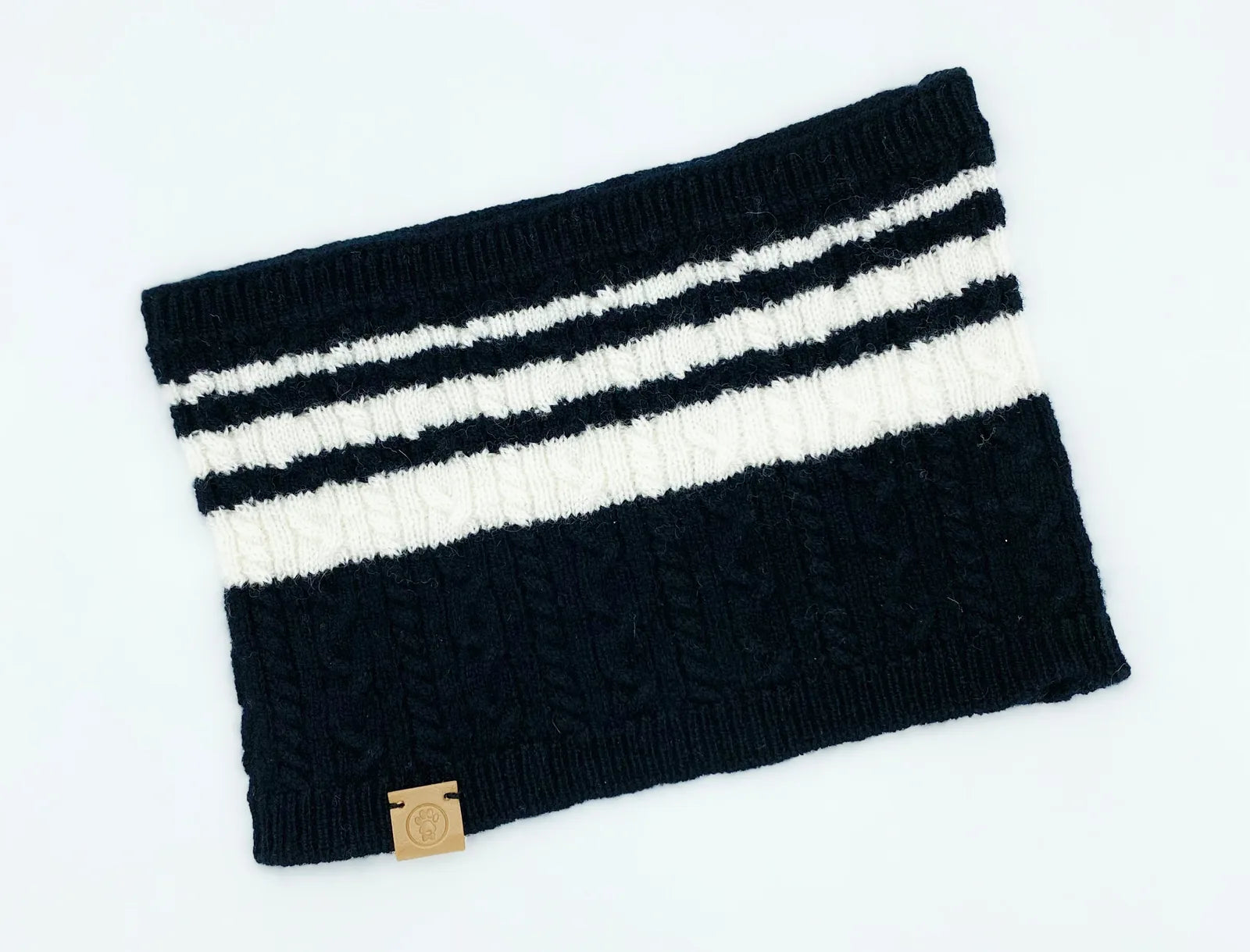 Cozy black and white striped bandana made from a soft wool-cashmere blend, perfect for pets and their humans.