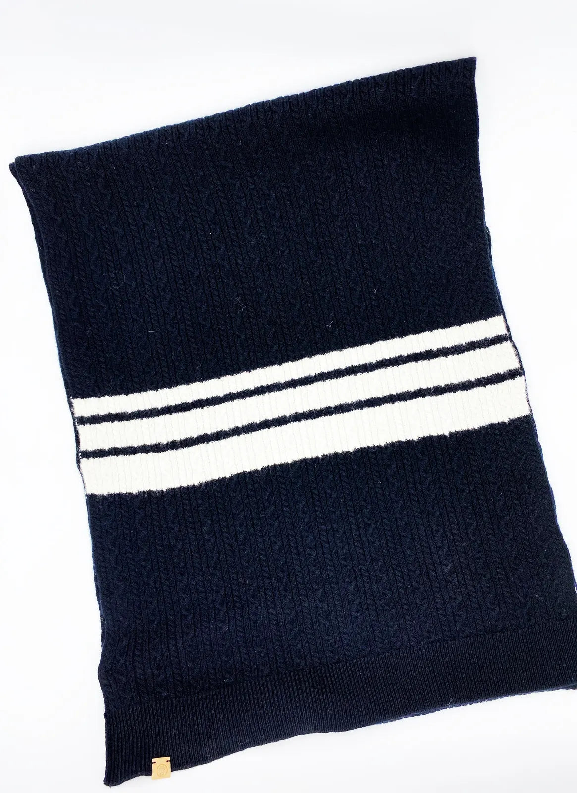Cozy black and white cashmere blend bandana featuring ribbed texture and striped design, perfect for pet and owner matching.