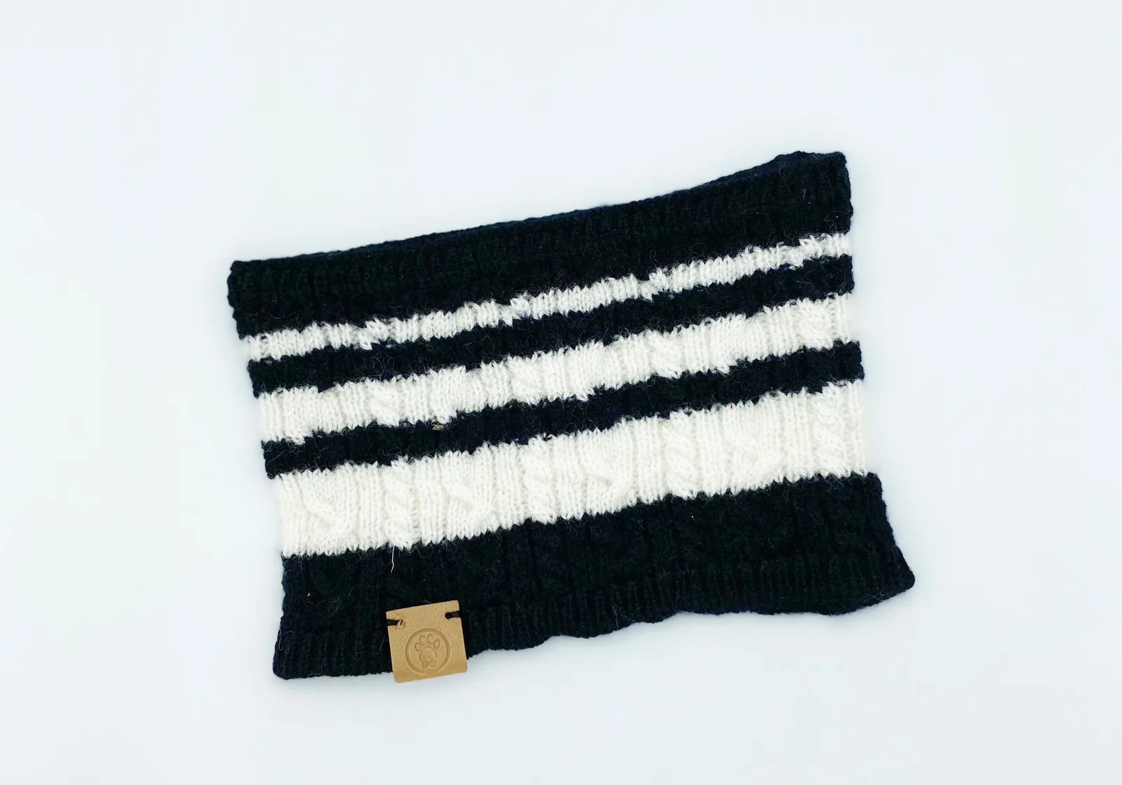 Cozy black and white striped bandana made from a wool-cashmere blend, featuring a branded leather tag.