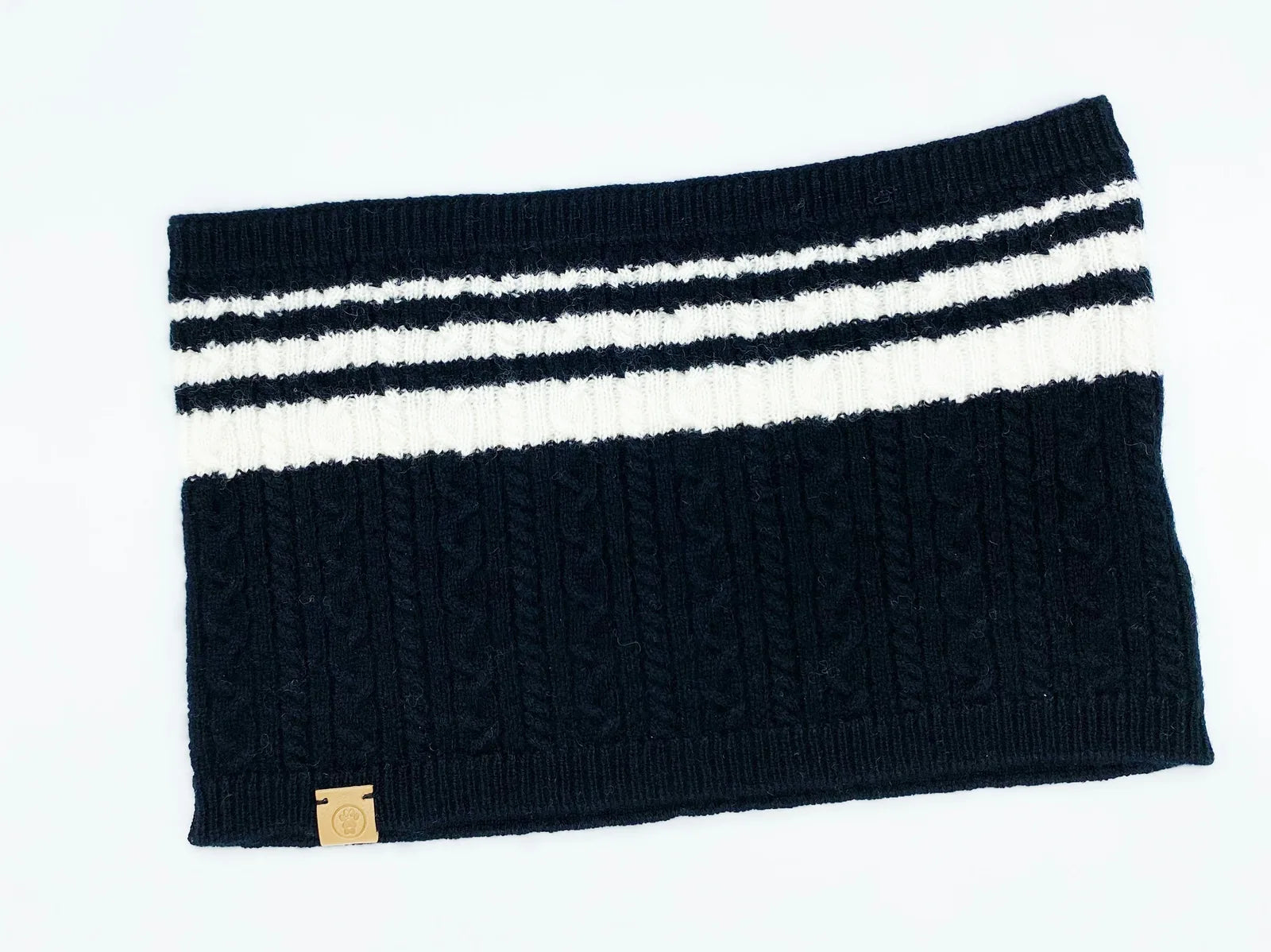 Cozy black and white bandana with a striped pattern and textured knit design, made from a soft wool-cashmere blend.