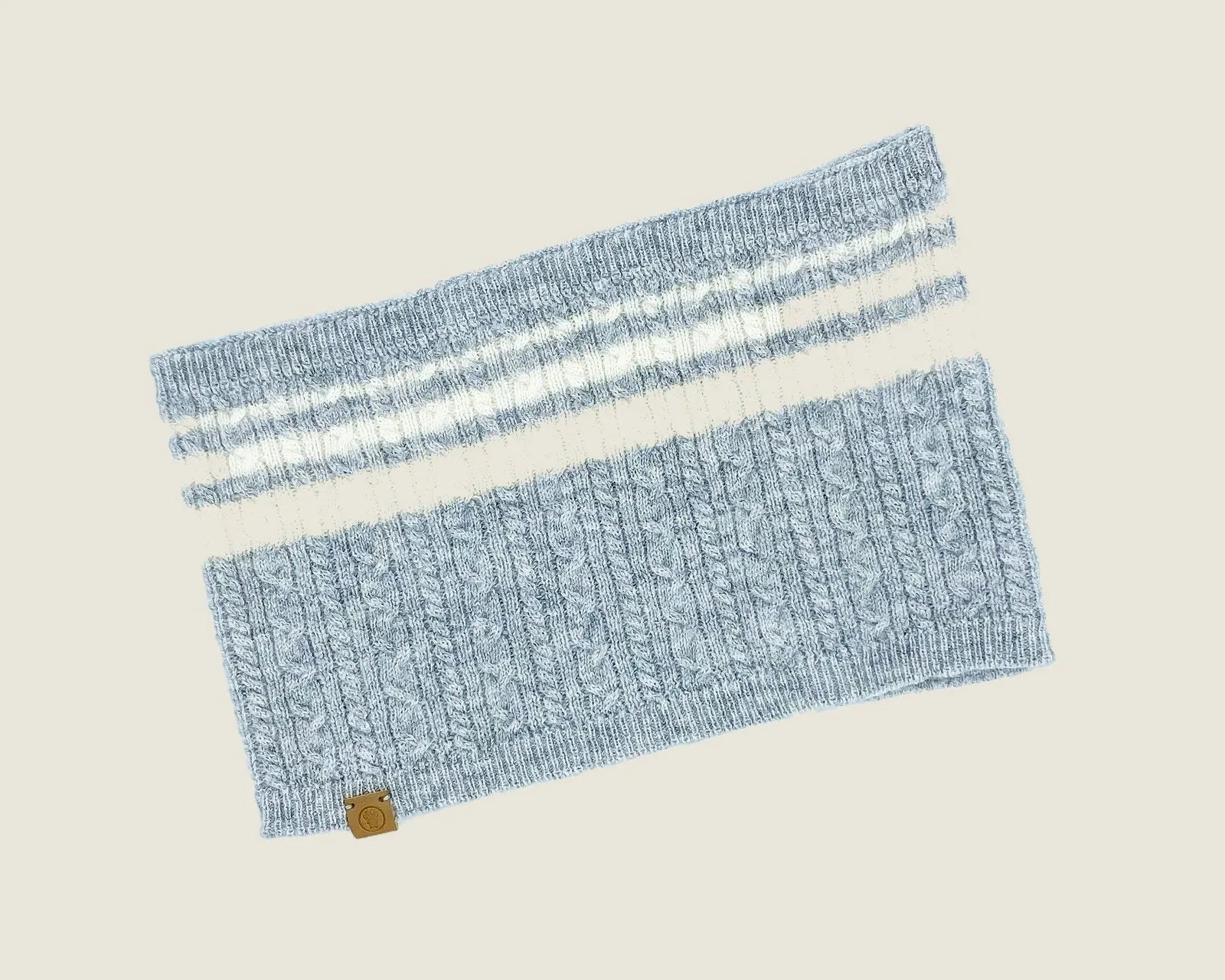 Heather grey knit scarf with textured pattern, featuring white stripes and a logo tag, designed for pets and humans.