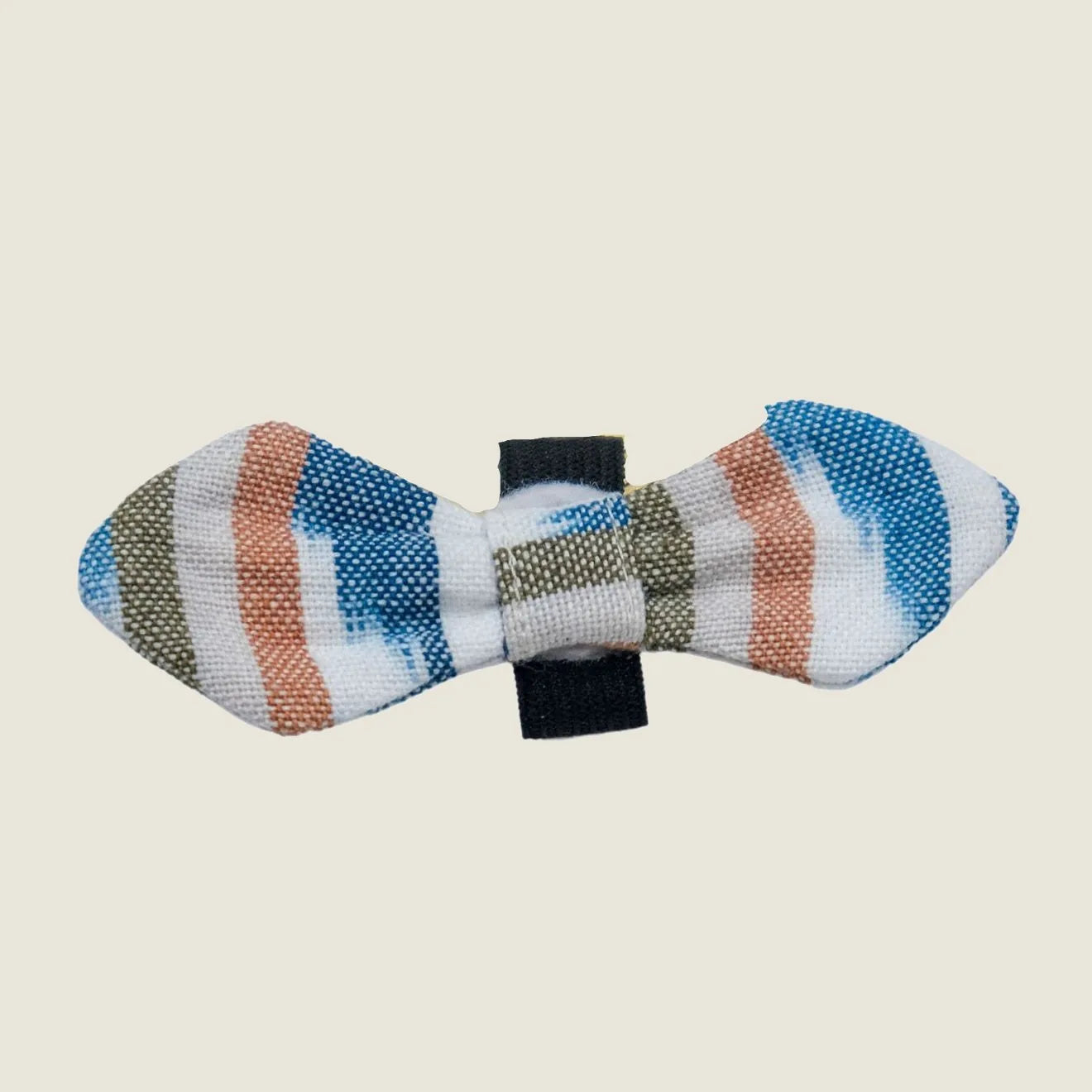 Handcrafted bow tie for pets in blue, white, and earthy stripes, designed to slip onto collars easily.