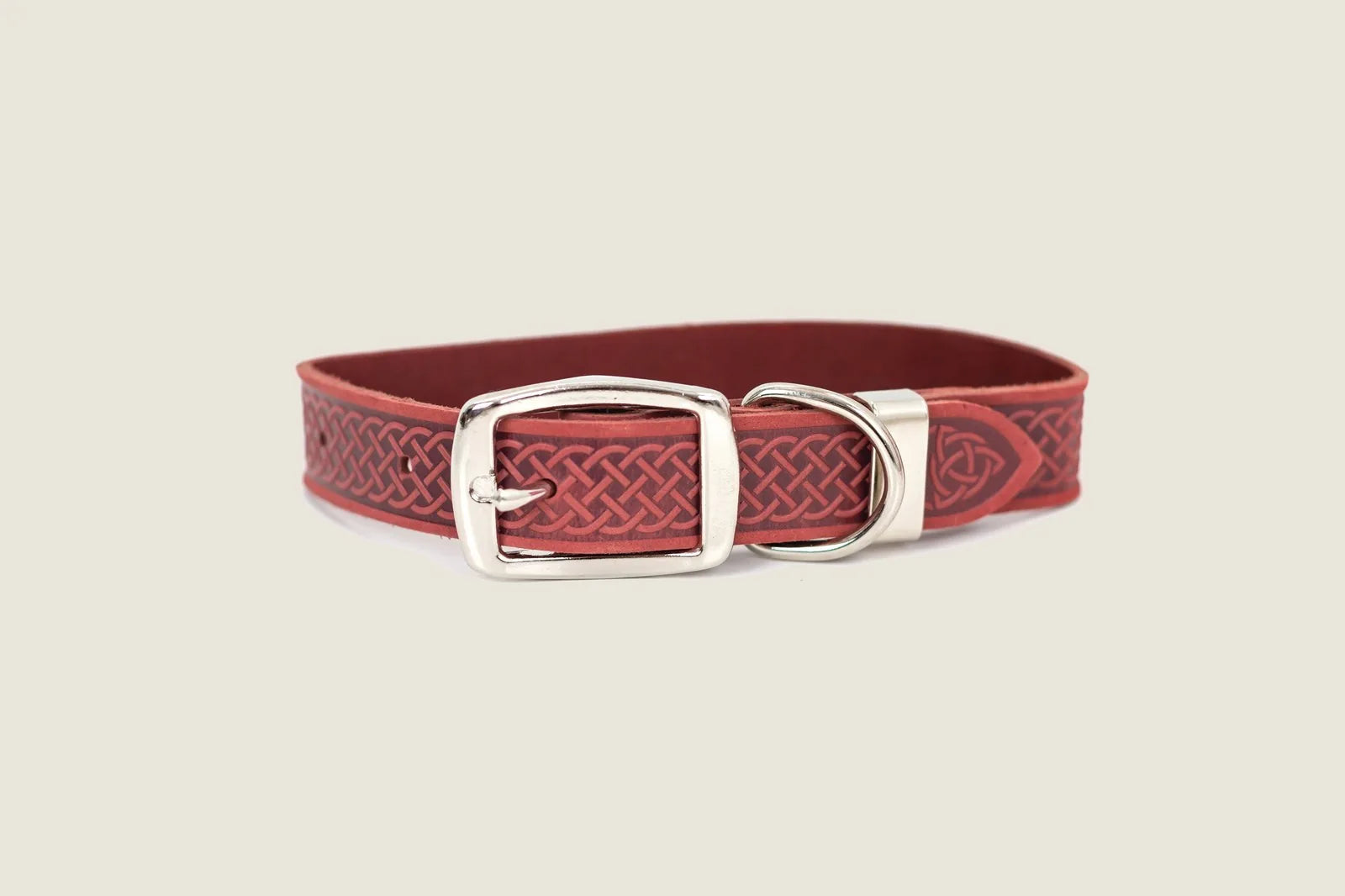Bark Brown leather dog collar with Celtic design, featuring a silver buckle and metal loop for secure fit.