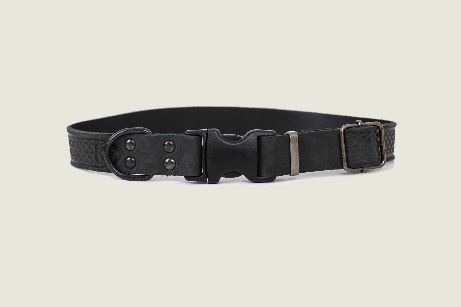 Midnight black leather dog collar featuring Celtic Fire & Water Rune design and quick-release buckle.