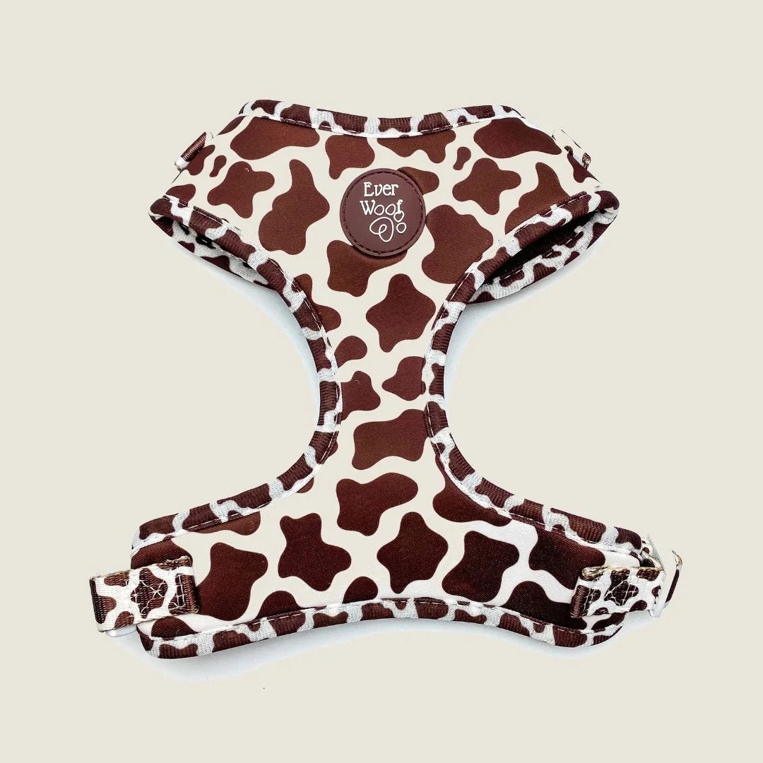 Brown cow print adjustable harness by EverWoof, made from neoprene with a breathable lining and adjustable straps.