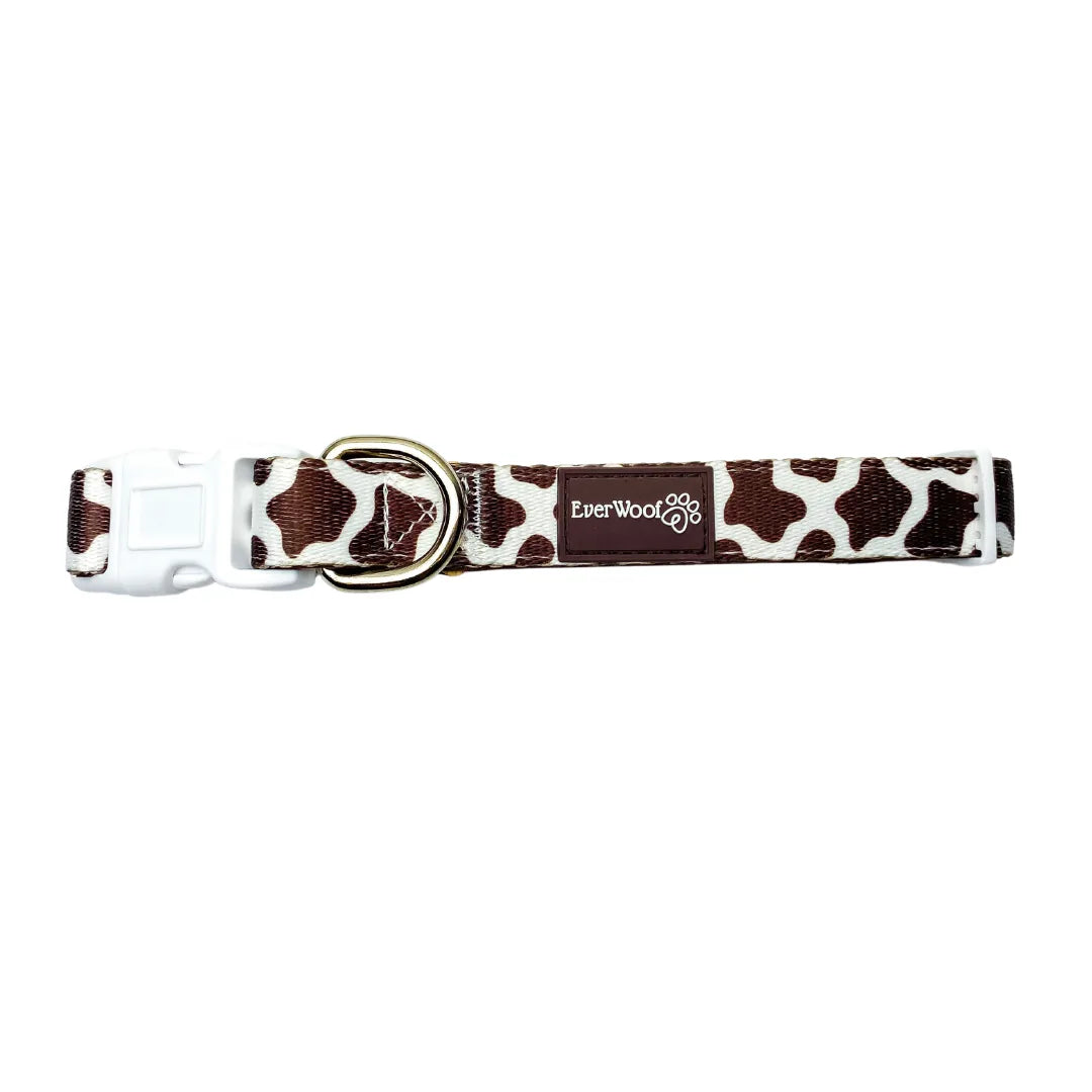 Chocolate Cow Collar by EverWoof featuring a cow print design, adjustable fit, durable polyester webbing, and neoprene pad...