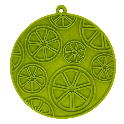 Lime green citrus-themed enrichment lick mat featuring suction cups and multi-textured patterns for dogs and cats.