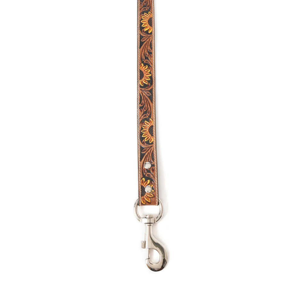 Light brown leather dog leash with floral embossing, metallic accents, and sturdy hardware, perfect for stylish walks.