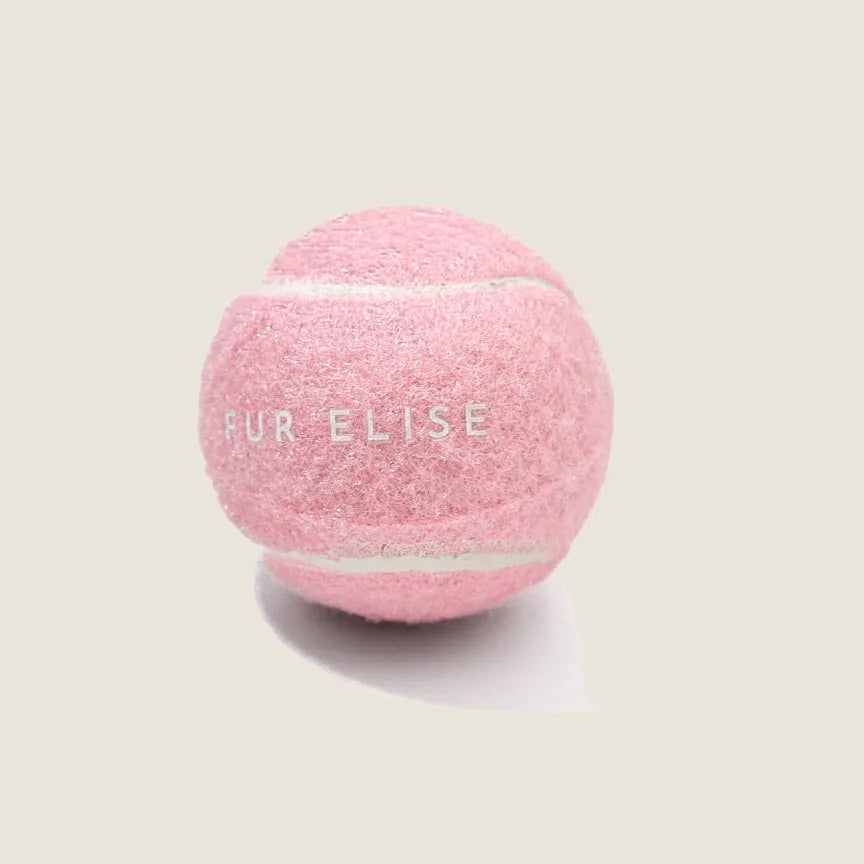 Classic pink tennis ball for dogs, made from pet-safe poly felt with white stripes and "FUR ELISE" text.