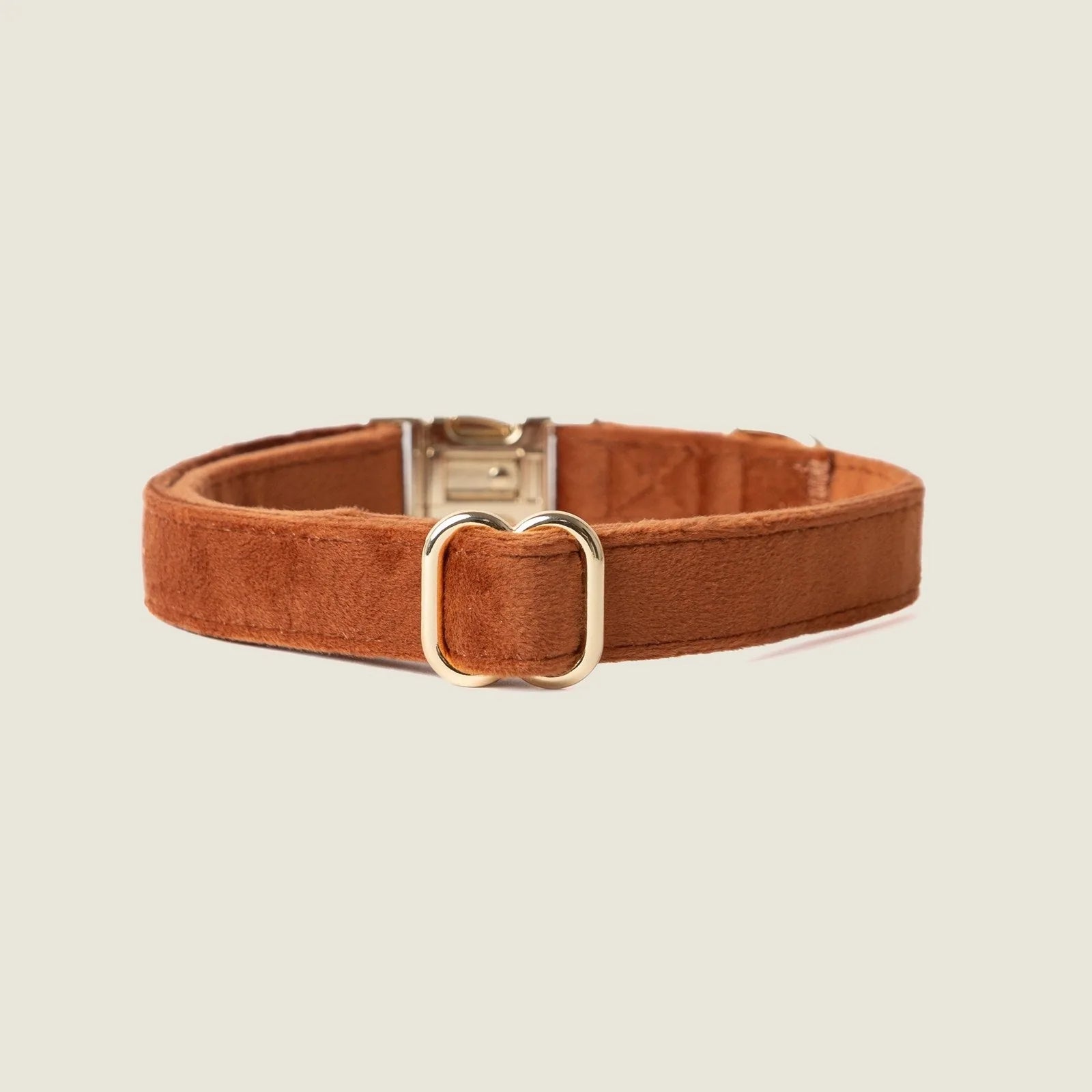 Clay velvet dog collar by FURLOU in warm brown with a gold buckle, perfect for stylish everyday wear.