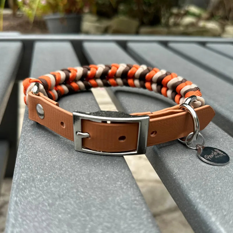 Handmade dog collar in burnt orange, walnut brown, and light tan, featuring a braided design and adjustable strap.