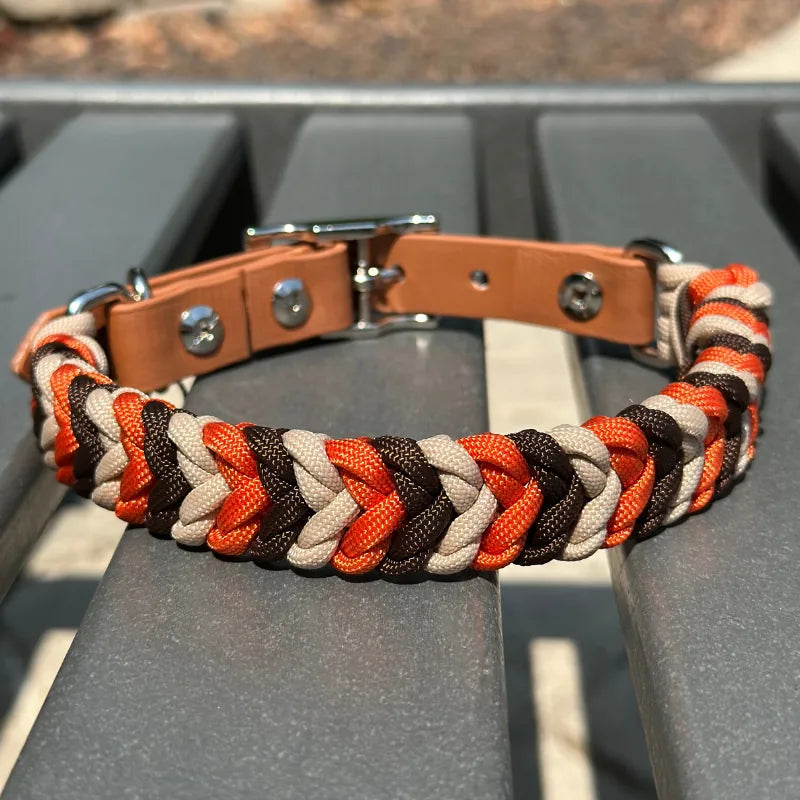 Hand braided dog collar in burnt orange, walnut brown, and light tan, featuring an adjustable light brown strap and metal...