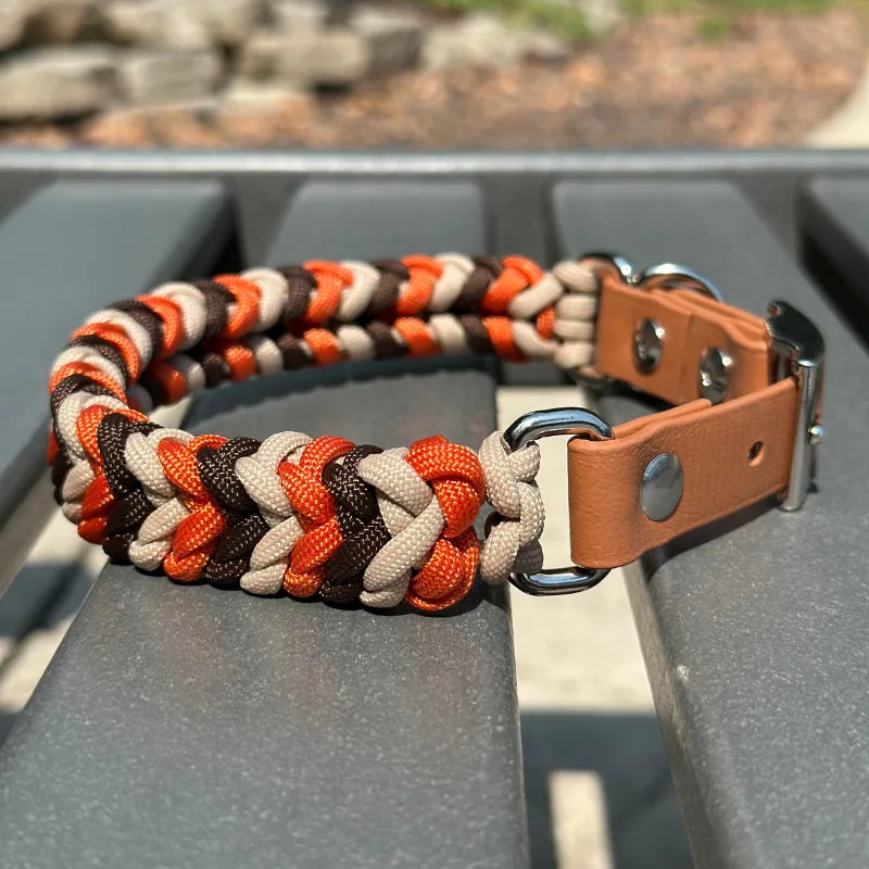 Hand-braided dog collar featuring burnt orange, walnut brown, and light tan nylon paracord with a leather adjustable strap.