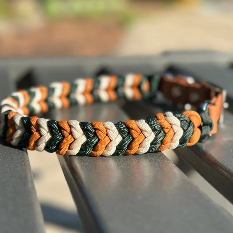 Handmade braided dog collar in hunter green, mustard yellow, and cream, featuring a sturdy D-ring and adjustable strap.