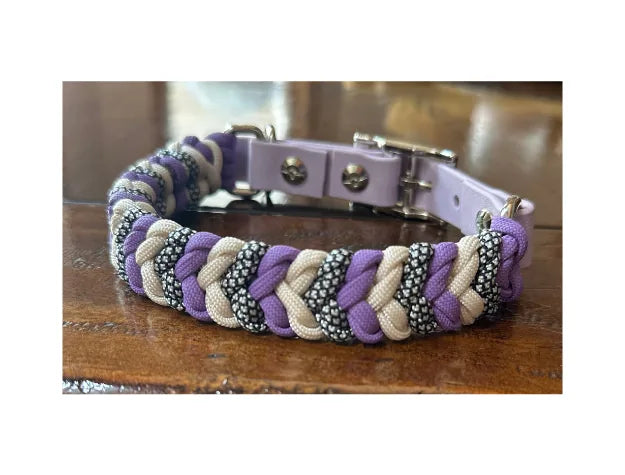 Braided dog collar featuring lilac, cream, and black diamond patterns with a pastel purple buckle and silver hardware.