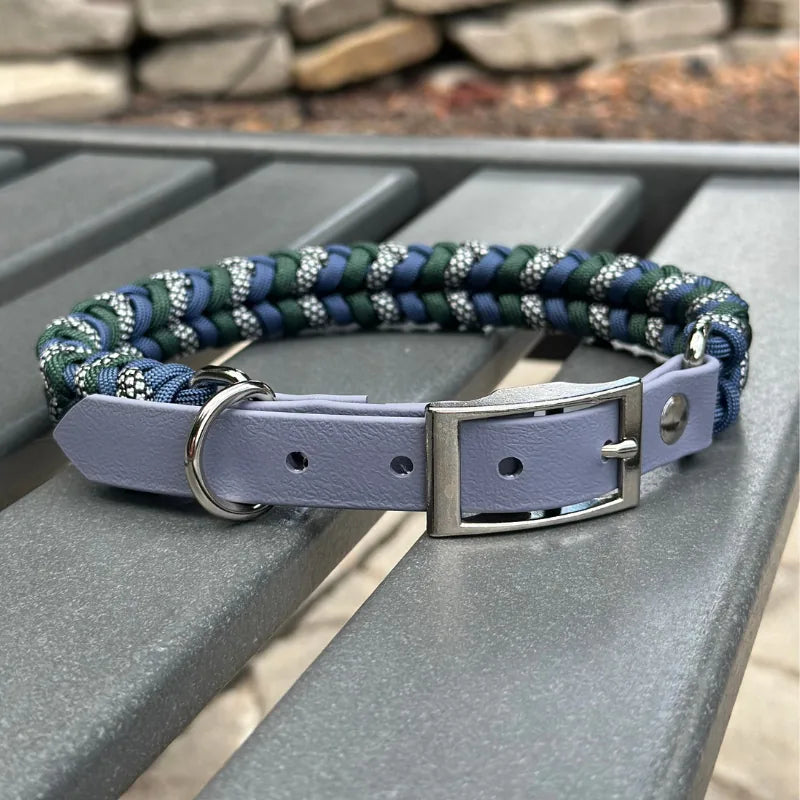 Handmade braided dog collar featuring navy blue, emerald green, and silver diamonds pattern with a durable BioThane® buckle.