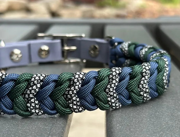 Handmade braided dog collar featuring navy blue, emerald green, and silver diamonds pattern with a durable buckle.
