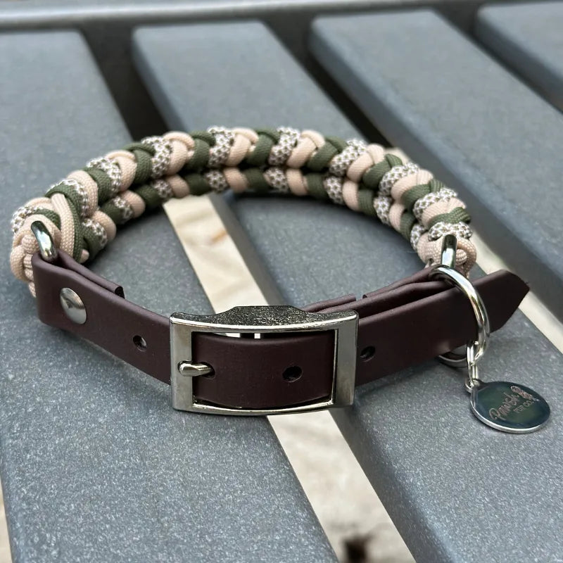 Hand-braided dog collar in olive, light tan, and coyote brown with a dark brown adjustable strap and nickel-plated buckle.