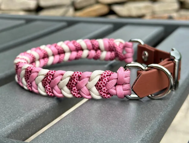 Handmade pink, cream, and red diamond-patterned nylon dog collar with a brown adjustable strap and sturdy D-ring.